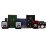 A COLLECTION OF WORLD PROOF COIN SETS