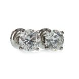 A PAIR OF CERTIFICATED DIAMOND STUD EARRINGS