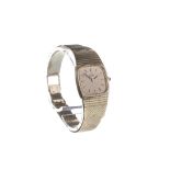 A LADY'S OMEGA NINE CARAT GOLD MANUAL WIND WRIST WATCH