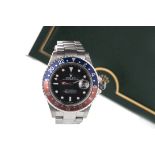 A GENTLEMAN'S ROLEX GMT MASTER II WRIST WATCH