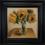 SUNFLOWERS IN A GLASS VASE, AN OIL BY GRAHAM MCKEAN