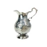 A SILVER CREAM JUG