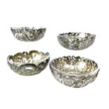 A MATCHED SET OF FOUR CHINESE SILVER DISHES