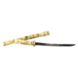 AN EARLY 20TH CENTURY JAPANESE IVORY CASED SWORD