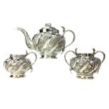 AN INDIAN SILVER THREE PIECE TEA SERVICE