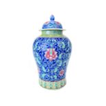 A 20TH CENTURY CHINESE POLYCHROME LIDDED VASE