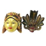 A LOT OF TWO CARVED WALL MASKS