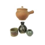 A ST. IVES STUDIO POTTERY LIDDED JAR ALONG WITH TWO VASES AND A BRUSH WASH