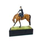 A ROYAL WORCESTER FIGURE OF A LADY ON HORSEBACK