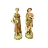 A PAIR OF ROYAL DUX FIGURES