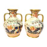 A PAIR OF LATE VICTORIAN STAFFORDSHIRE IMARI VASES