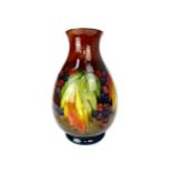 AN EARLY 20TH CENTURY MOORCROFT FLAMBE VASE