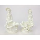 A PAIR OF MOORE FIGURAL DISHES