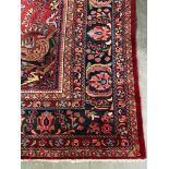 A MID-20TH CENTURY HAND-KNOTTED PERSIAN CARPET