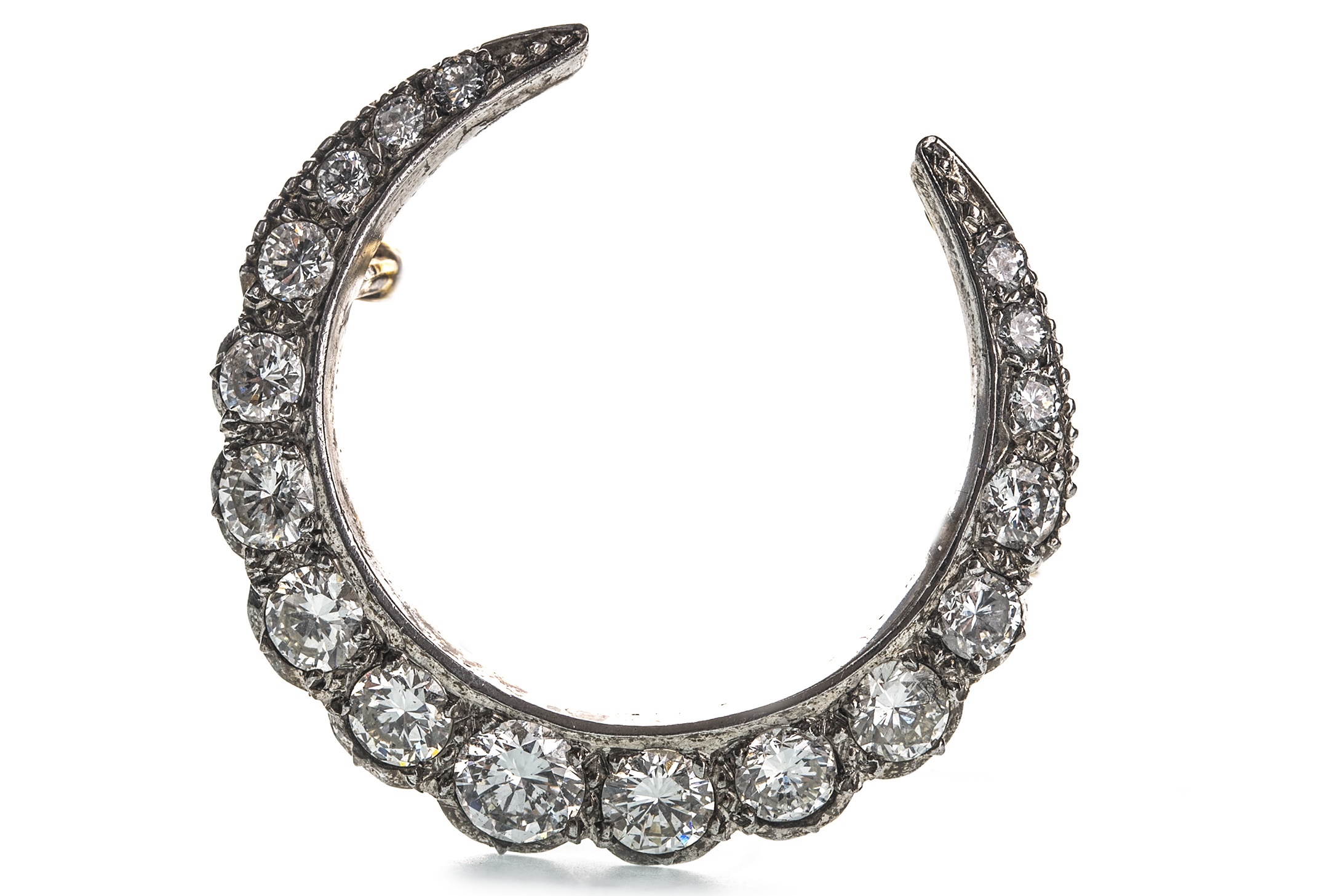 A DIAMOND CRESCENT MOON BROOCH