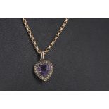 A PURPLE GEM SET AND SEED PEARL PENDANT ON CHAIN