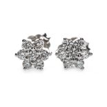 A PAIR OF DIAMOND FLOWER CLUSTER EARRINGS