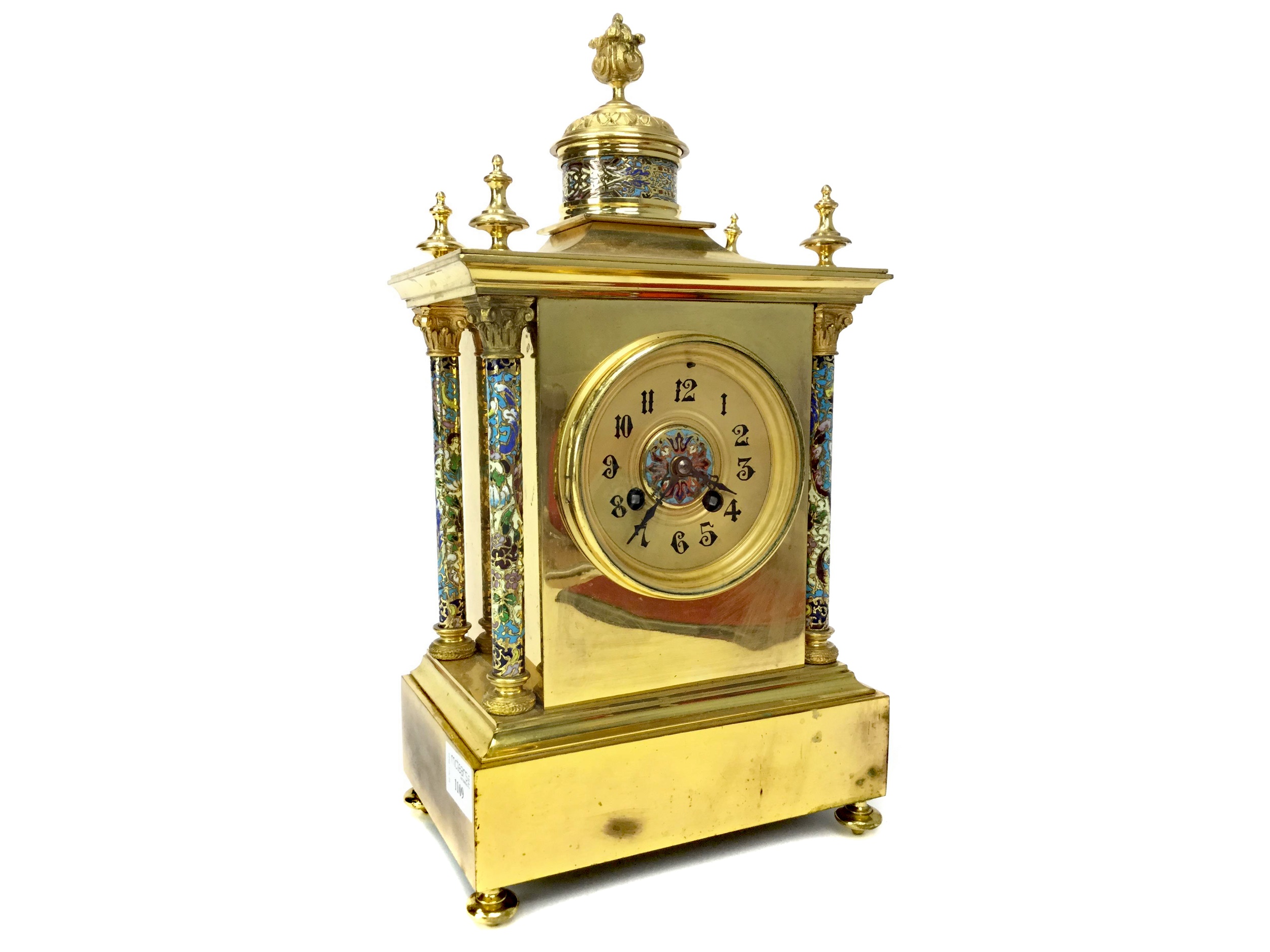 A LATE 19TH CENTURY FRENCH BRASS AND CHAMPLEVE ENAMEL CLOCK