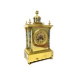 A LATE 19TH CENTURY FRENCH BRASS AND CHAMPLEVE ENAMEL CLOCK
