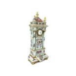 A LATE 19TH CENTURY SAMSON OF PARIS ARMORIAL MANTEL CLOCK