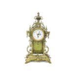 AN EARLY 20TH CENTURY FRENCH GILT METAL MANTEL CLOCK
