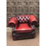 AN OXBLOOD LEATHER TUB ARMCHAIR