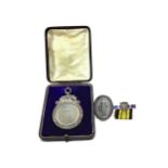 AN EDWARDIAN SILVER DRAUGHTS MEDAL ALONG WITH ANOTHER MEDAL AND A CLASP