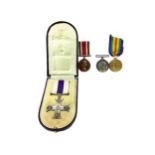 A MILITARY CROSS AND THREE OTHER MEDALS