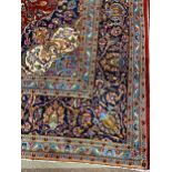 A FINE HAND KNOTTED WOOL PERSIAN CARPET