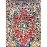 A MID 20TH CENTURY WOOL HAND KNOTTED PERSIAN CARPET