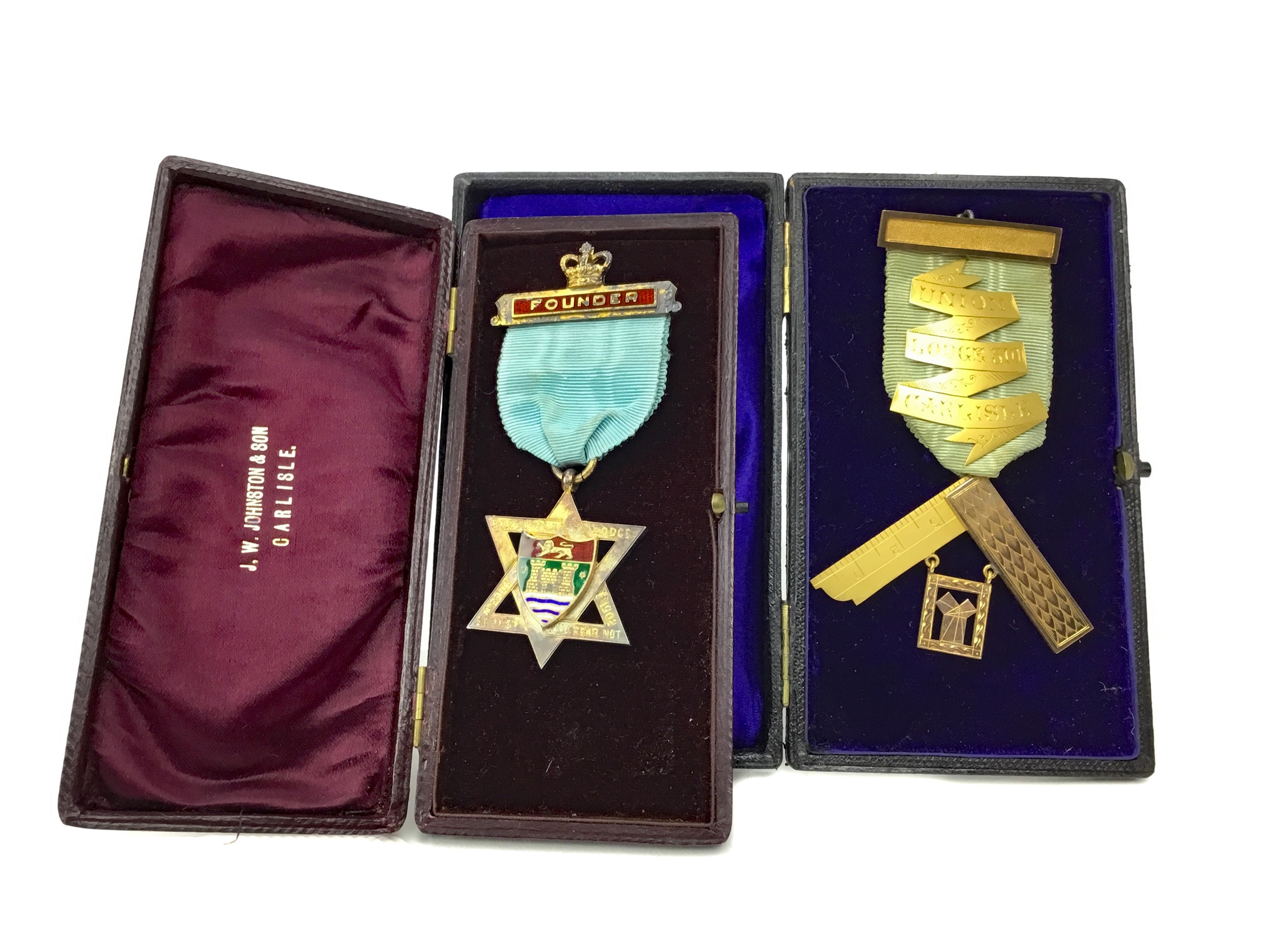 AN EDWARDIAN NINE CARAT GOLD MASONIC JEWEL AND ANOTHER