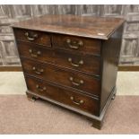 A GEORGE III MAHOGANY CHEST OF DRAWERS