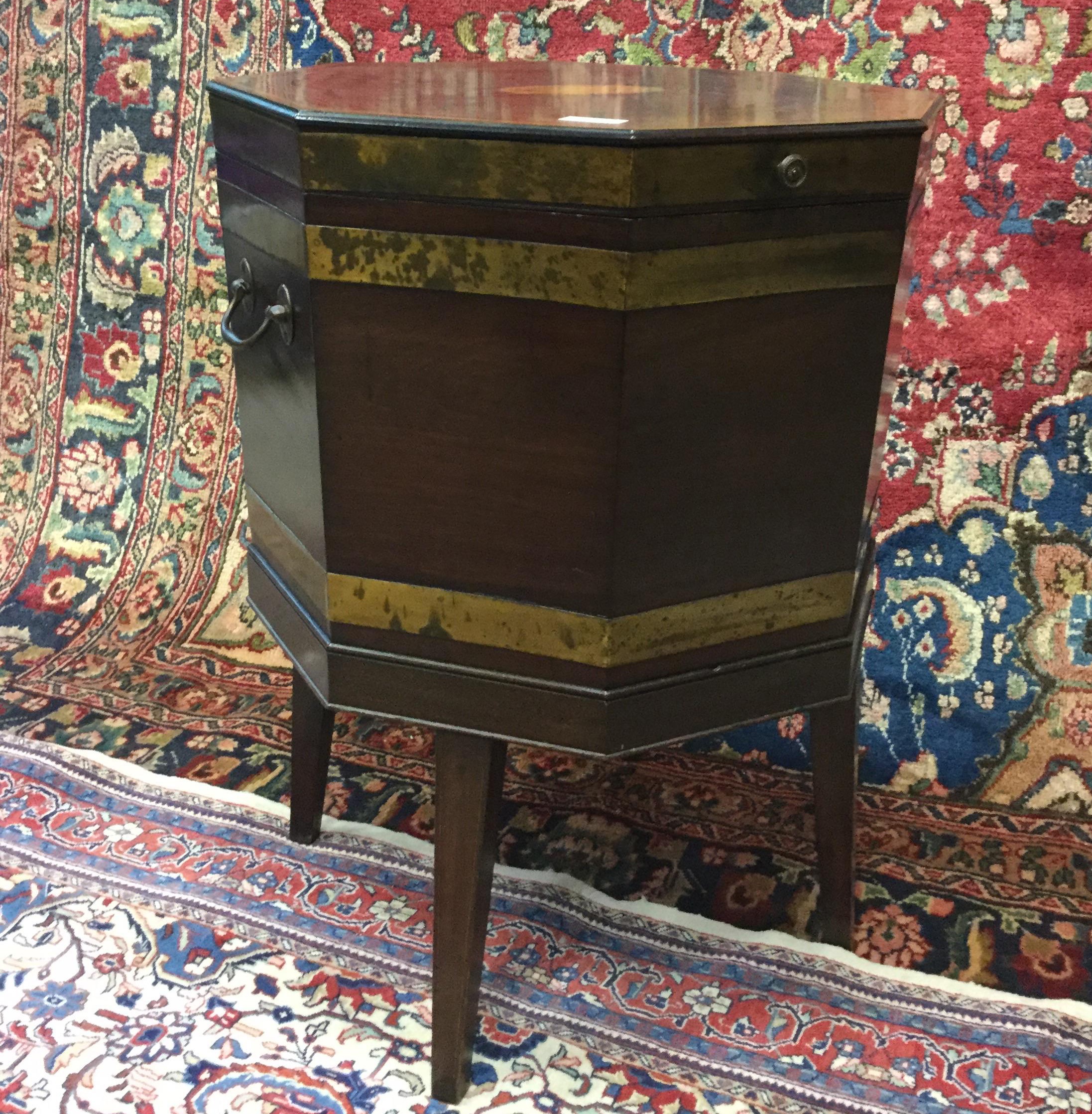 A REGENCY MAHOGANY OCTAGONAL WINE COOLER