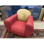 A DESIGNER RED FABRIC ARMCHAIR FROM THE ARTHOUSE HOTEL