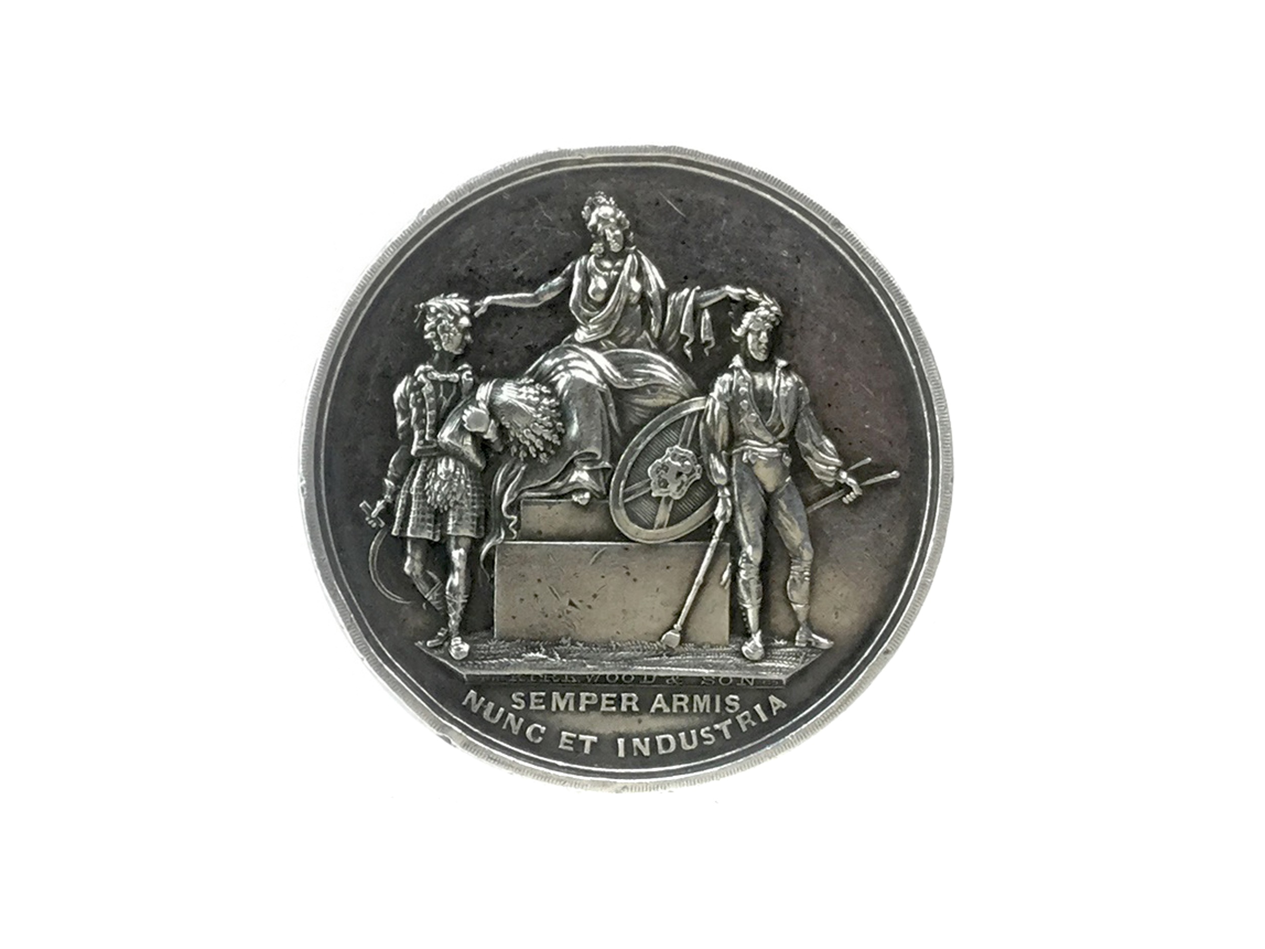 A VICTORIAN SILVER PRESENTATION MEDALLION