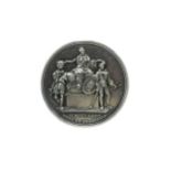 A VICTORIAN SILVER PRESENTATION MEDALLION