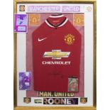 A SIGNED MANCHESTER UNITED FOOTBALL CLUB JERSEY