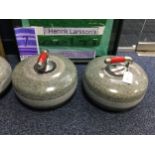 A PAIR OF GRANITE CURLING STONES