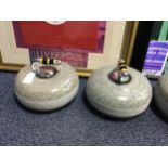 A PAIR OF GRANITE CURLING STONES