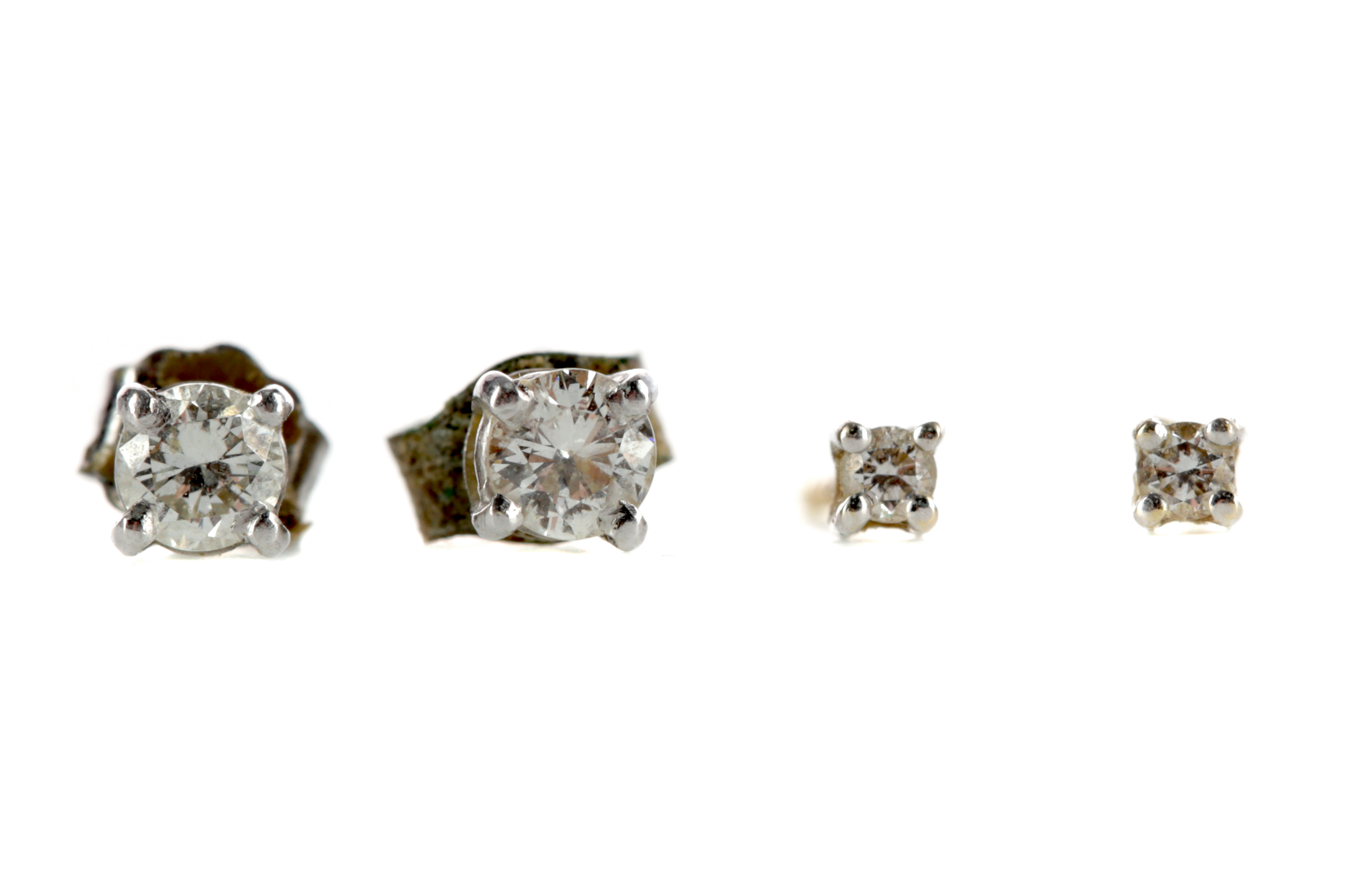 TWO PAIRS OF DIAMOND STUD EARRINGS