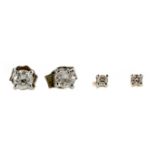 TWO PAIRS OF DIAMOND STUD EARRINGS