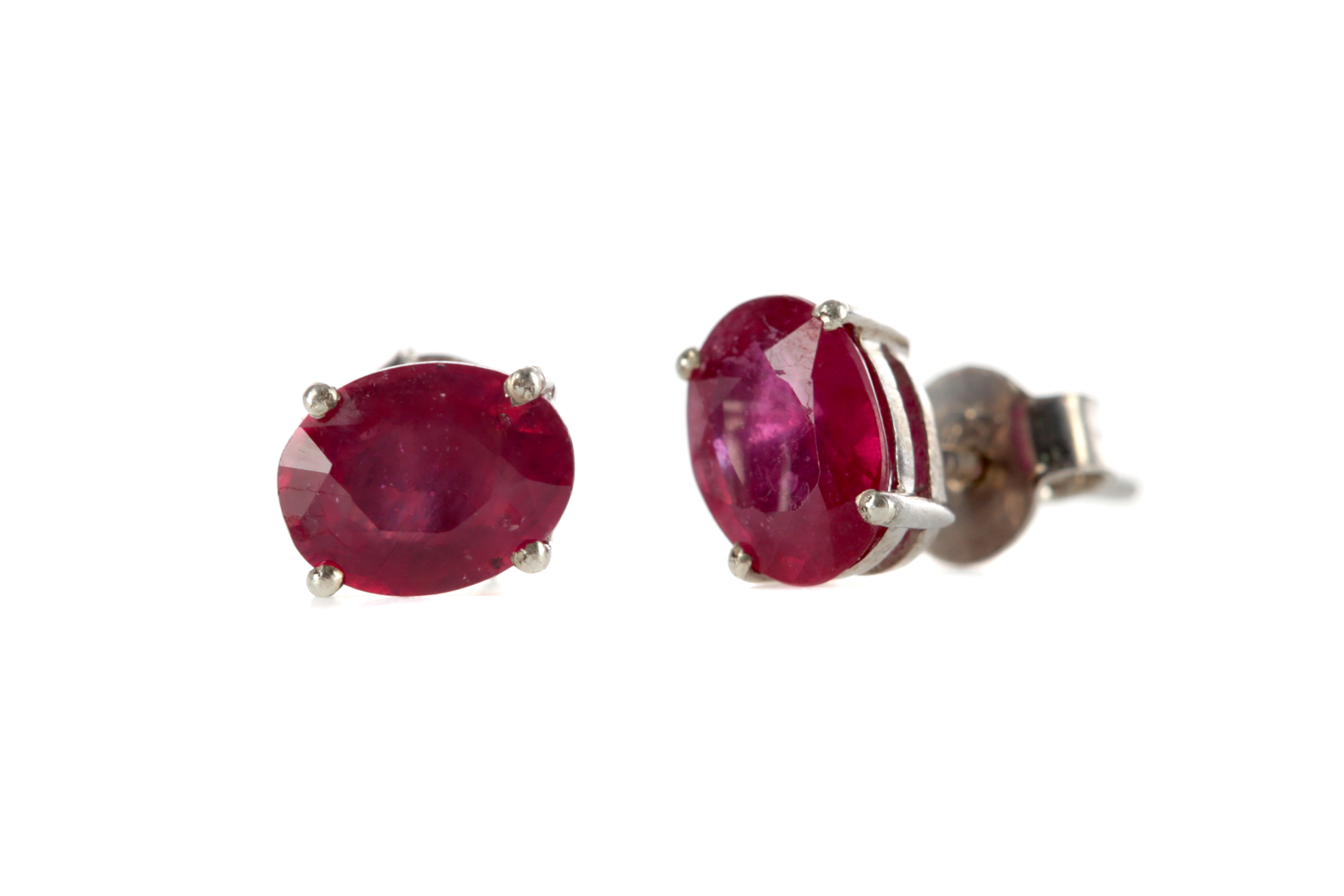 A PAIR OF TREATED RUBY EARRINGS