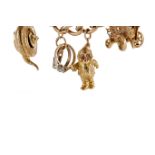 A GOLD CHARM BRACELET