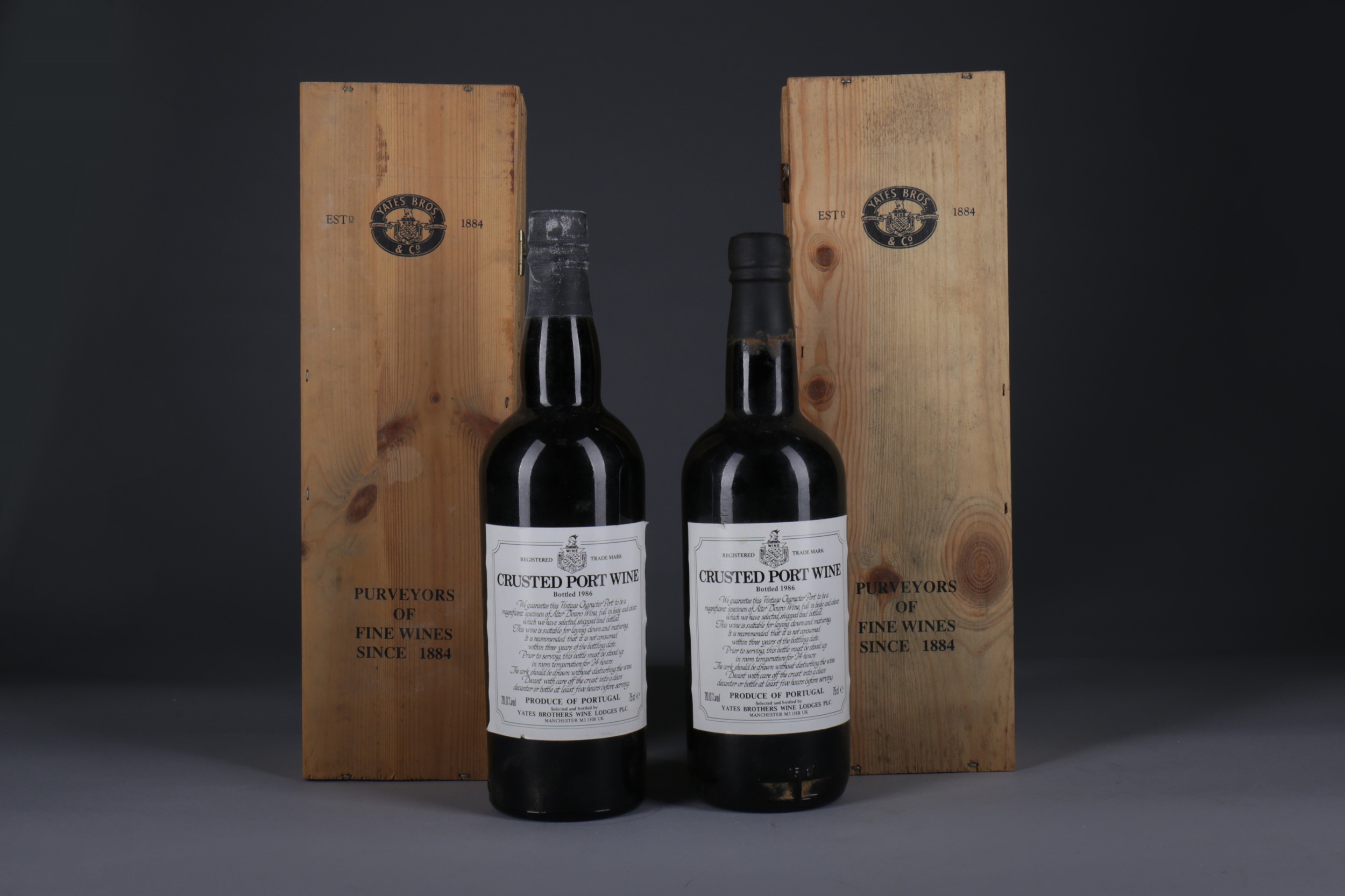 TWO BOTTLES OF YATES BROTHERS CRUSTED PORT