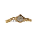 A LADY'S ROAMER NINE CARAT GOLD MANUAL WIND WRIST WATCH