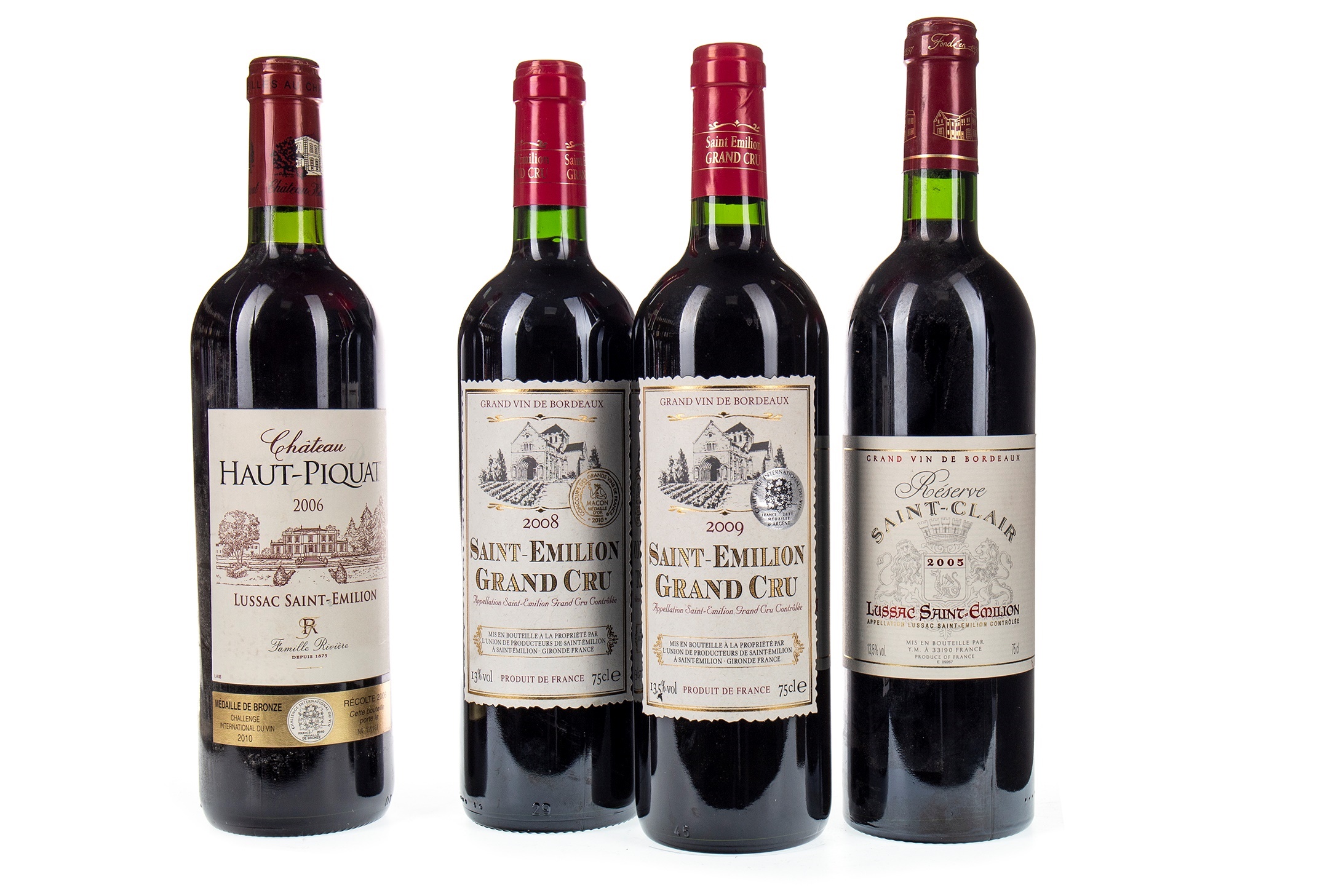 FOUR BOTTLES OF ST EMILLION