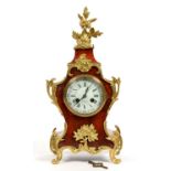 A FRENCH GILTMETAL MOUNTED TORTOISESHELL BRACKET CLOCK IN LOUIS XV STYLE, THE ENAMEL DIAL