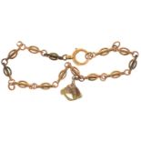 A GOLD BRACELET, WITH HORSE HEAD CHARM MARKED 9CT, 6.5G