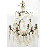 A BRASS SIX LIGHT CHANDELIER WITH FLAT AND PEAR SHAPED GLASS DROPS, 68CM H AND A SET OF FOUR AND A