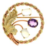 AN AMETHYST AND MOONSTONE BROOCH, OF NATURALISTIC DESIGN, IN GOLD MARKED 14K, 12.5G
